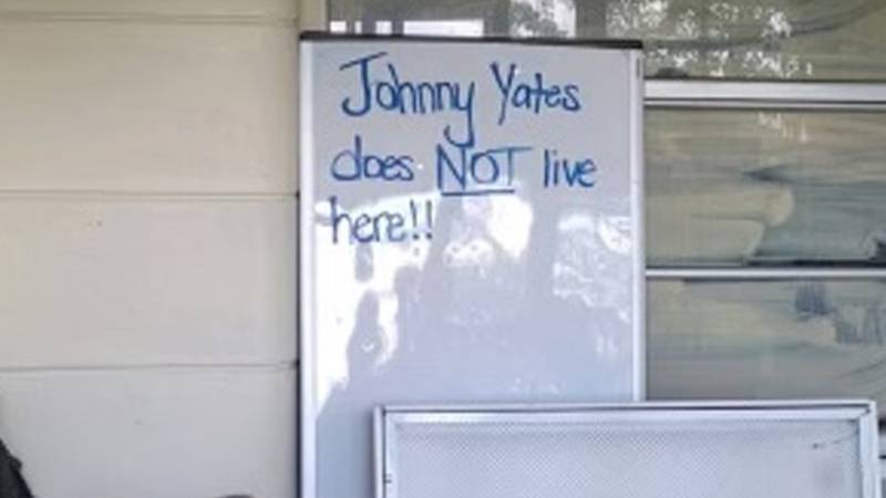 Deputies were skeptical about Johnny Yates' whereabouts, even after a sign noted that he was not at the residence.