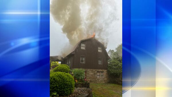 House catches fire after being struck by lightning in Marion Township, officials say