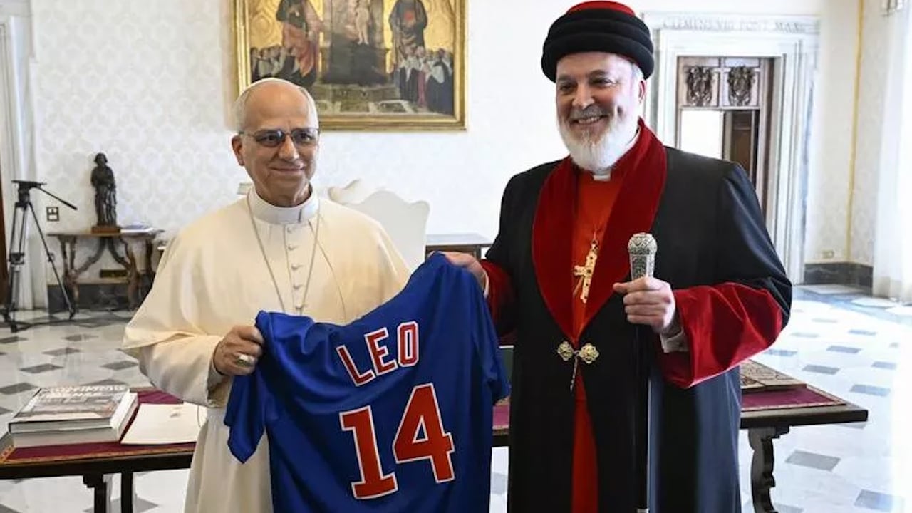 Pope Leo XIV roots for the White Sox, but he received a Cubs jersey at the Vatican on Monday.