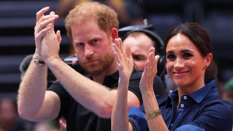 DUSSELDORF, GERMANY - SEPTEMBER 15: Meghan, Duchess of Sussex and Prince Harry, Duke of Sussex watch on during the Mixed Team Gold Medal match between Team Colombia and Team Poland during day six of the Invictus Games Düsseldorf 2023 on September 15, 2023 in Duesseldorf, Germany. (Photo by Joern Pollex/Getty Images for Invictus Games Düsseldorf 2023)
