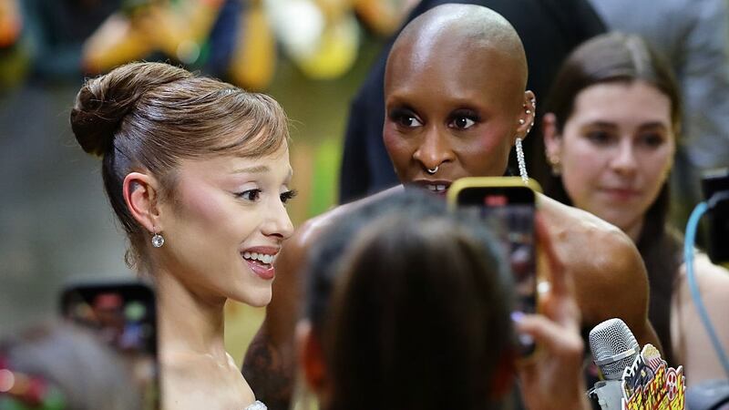 Cynthia Erivo protects Ariana Grande from carpet crasher at ‘Wicked: For Good’ premiere