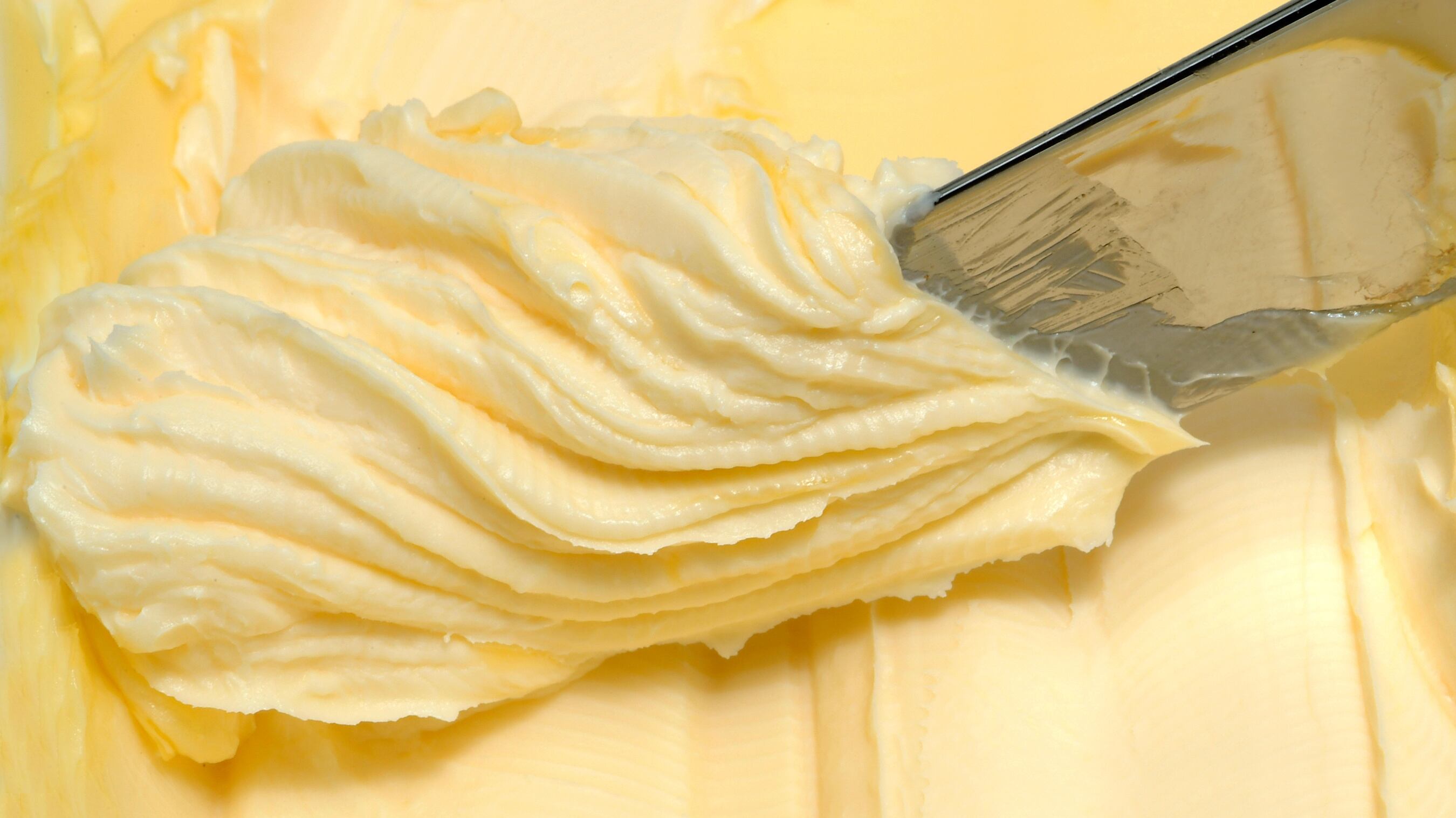 Butter and knife, background