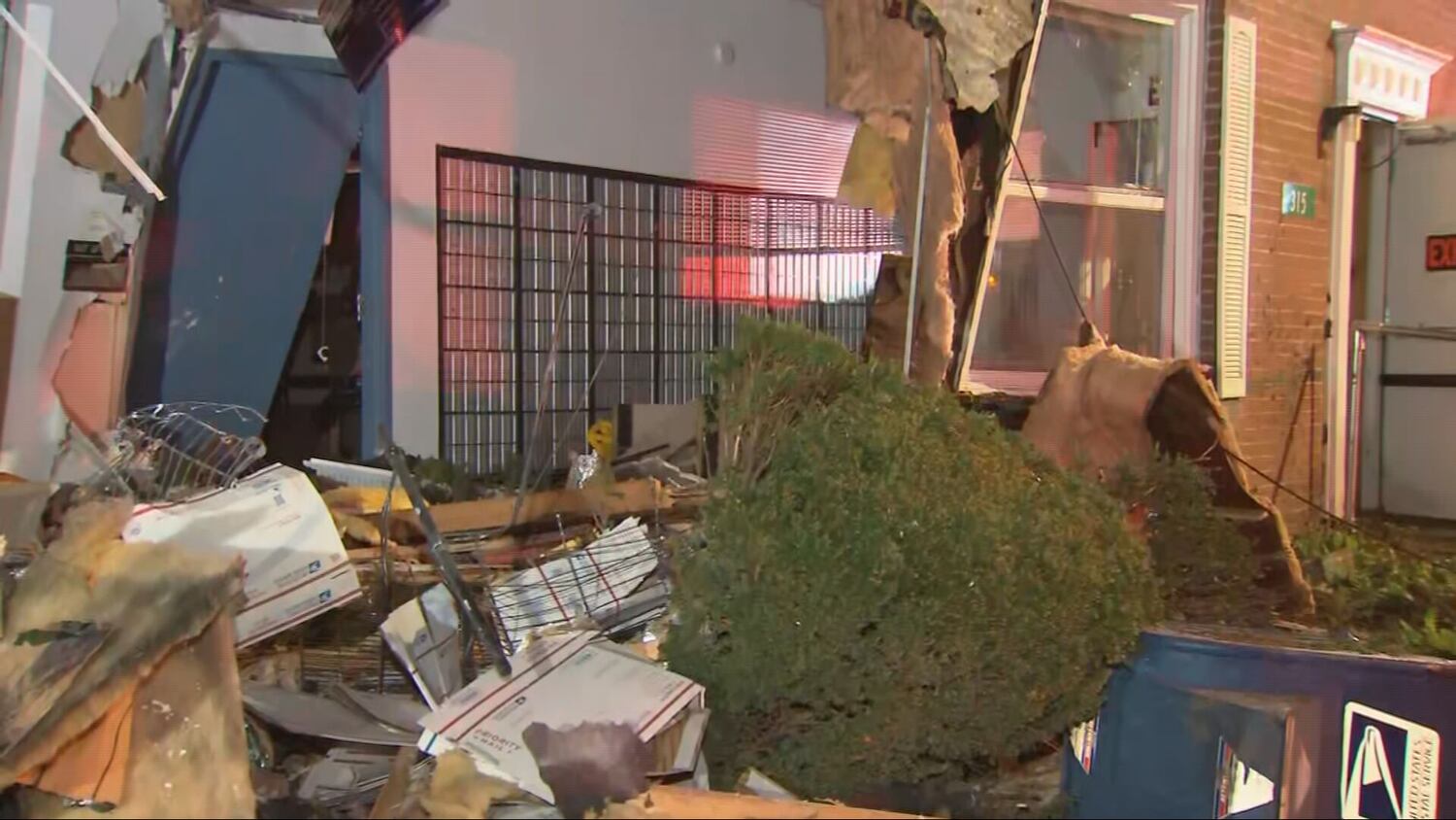 Photos truck slams into post office following police chase in fayette