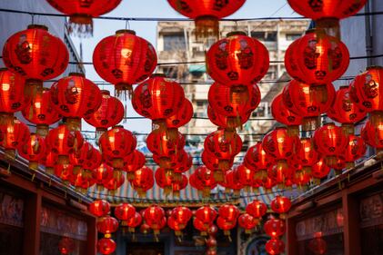 BANGKOK, THAILAND - FEBRUARY 09: A view of Chinese lanterns at a temple on Lunar New Years Eve on February 09, 2024 in Bangkok, Thailand. The Chinese diaspora of Southeast Asia celebrates a lively Lunar New Year in Bangkok's Chinatown. It is traditionally a time for people to meet their relatives and take part in celebrations with families. In Thailand, which has a sizeable population of Chinese lineage, people gather with family and celebrate with feasts and visits to temples. The Tourism Authority of Thailand is expecting a steep increase in tourism during the Lunar New Year now that visa free travel is permmited for Chinese citizens to Thailand. (Photo by Lauren DeCicca/Getty Images)