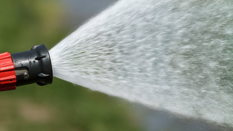 Firefighter floods baseball field after fly ball hits personal vehicle