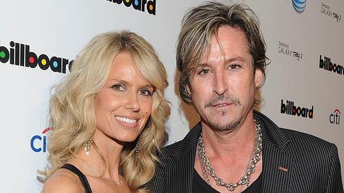 WEST HOLLYWOOD, CA - FEBRUARY 10: Recording artist Charlie Colin of Train (R) and his wife (L) attend Citi And AT&T Present The Billboard After Party at The London Hotel on February 10, 2013 in West Hollywood, California. (Photo by Vivien Killilea/Getty Images for MAC Presents)