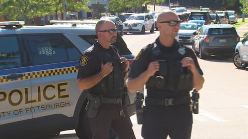 An officer was hit, as well as a suspect in an earlier shooting in Robinson Township, law enforcement sources tell Channel 11.