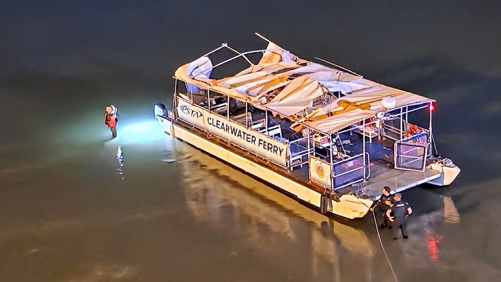 A ferry on a sandbar after a collision.