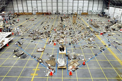 In this NASA handout, Columbia Space Shuttle debris lies floor of the RLV Hangar May 15, 2003 at Kennedy Space Center, Florida. More than 82,000 pieces have been delivered to the space center with 78,760 having been identified.  (Photo by NASA/Getty Images)