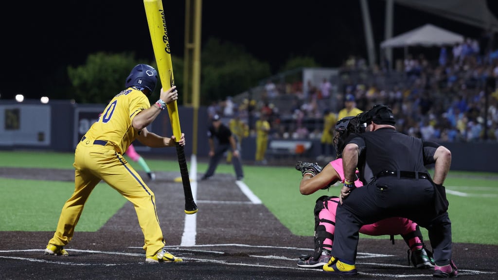 NEW YORK, NEW YORK - AUGUST 12: Alex Zeigler #10 of the Savannah Bananas comes to the plate with an oversized bat during their game against the Party Animals at Richmond County Bank Ball Park on August 12, 2023 in New York City. The Savannah Bananas were part of the Coastal Plain League, a summer collegiate league, for seven seasons. In 2022, the Bananas announced that they were leaving the Coastal Plain League to play Banana Ball year-round. Banana Ball was born out of the idea of making baseball more fast-paced, entertaining, and fun. (Photo by Al Bello/Getty Images)