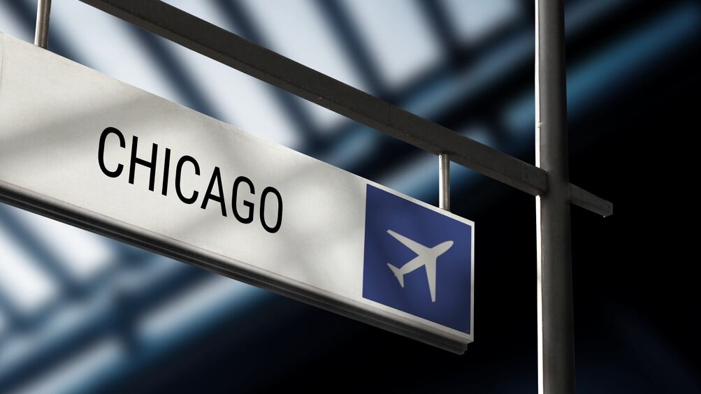 At least two people were injured when a shuttle bus and an airplane that was taxiing crashed Friday night at Chicago’s O’Hare International Airport.